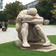 A statue of a man burdened by a turtle shell on his back shows “he has pressure in life. We think at night, ‘What you have done today and what are you going to do tomorrow?'”